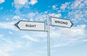 This is a photo of two signs pointing in opposite directions, one saying